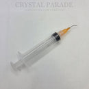 Single Syringe With Curved Orange Tip
