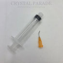 Single Syringe With Curved Orange Tip